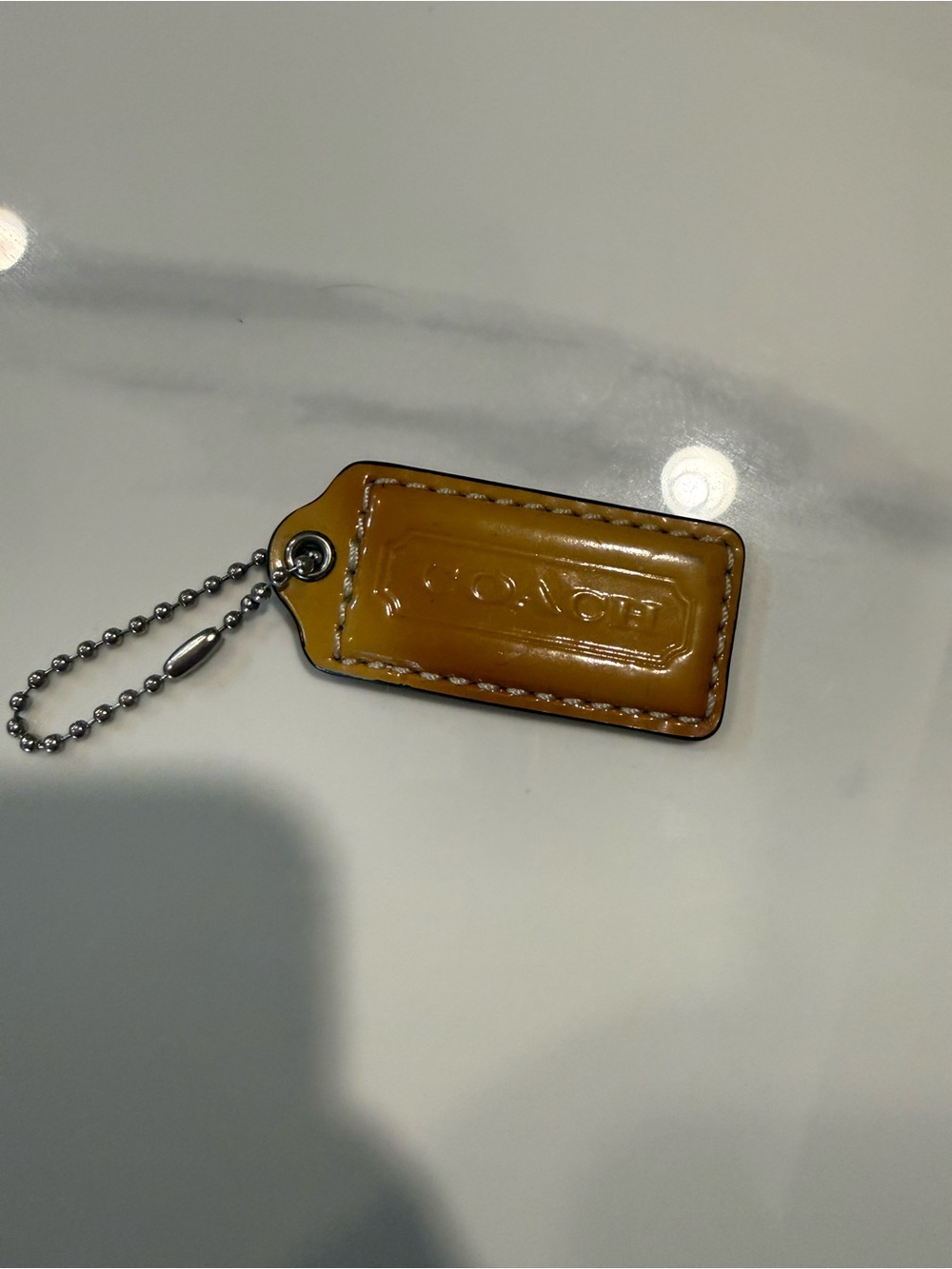 Coach Leather Key Tag in Mustard Brown